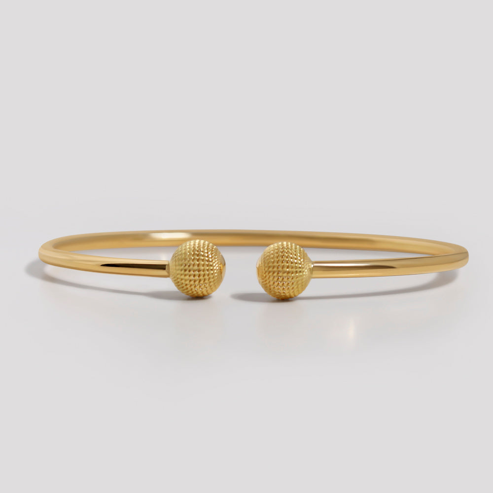 Gold bangle with balls 2025