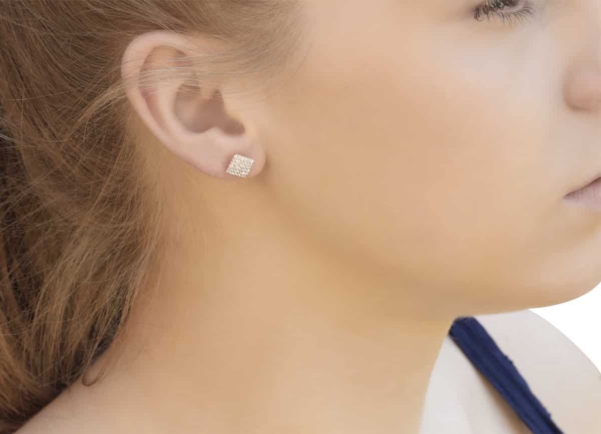 Gia Square 18ct Gold Stud Earrings On A Models Ears